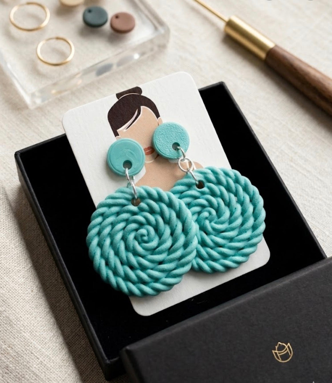3D-printed spiral earrings- Teal
